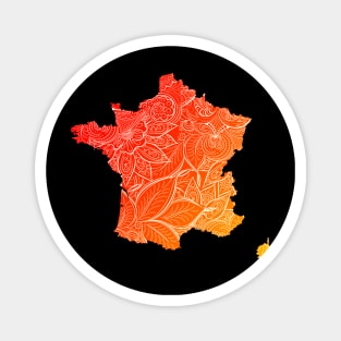 Colorful mandala art map of France with text in red and orange Magnet